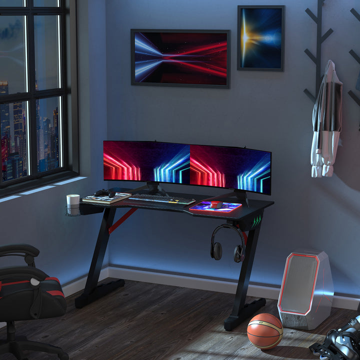 HOMCOM Racing Style Gaming Desk with LED Lights, Z-Shaped Computer Table Workstation with Cup Holder, Headphone Hook for Study, Home Office, Black